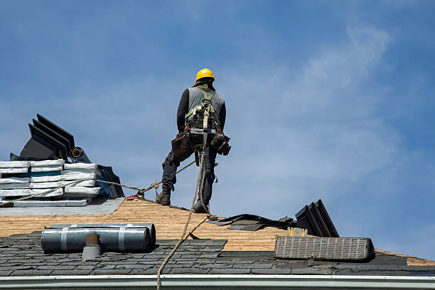 Professional Metal Roofing technician working in West Greenwich, RI